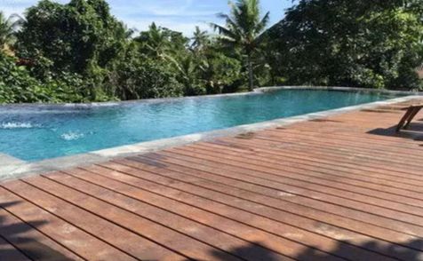 Teak pool decking in Bali villa